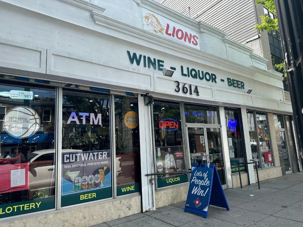 Liquor store storefront with wine, beer, and spirits